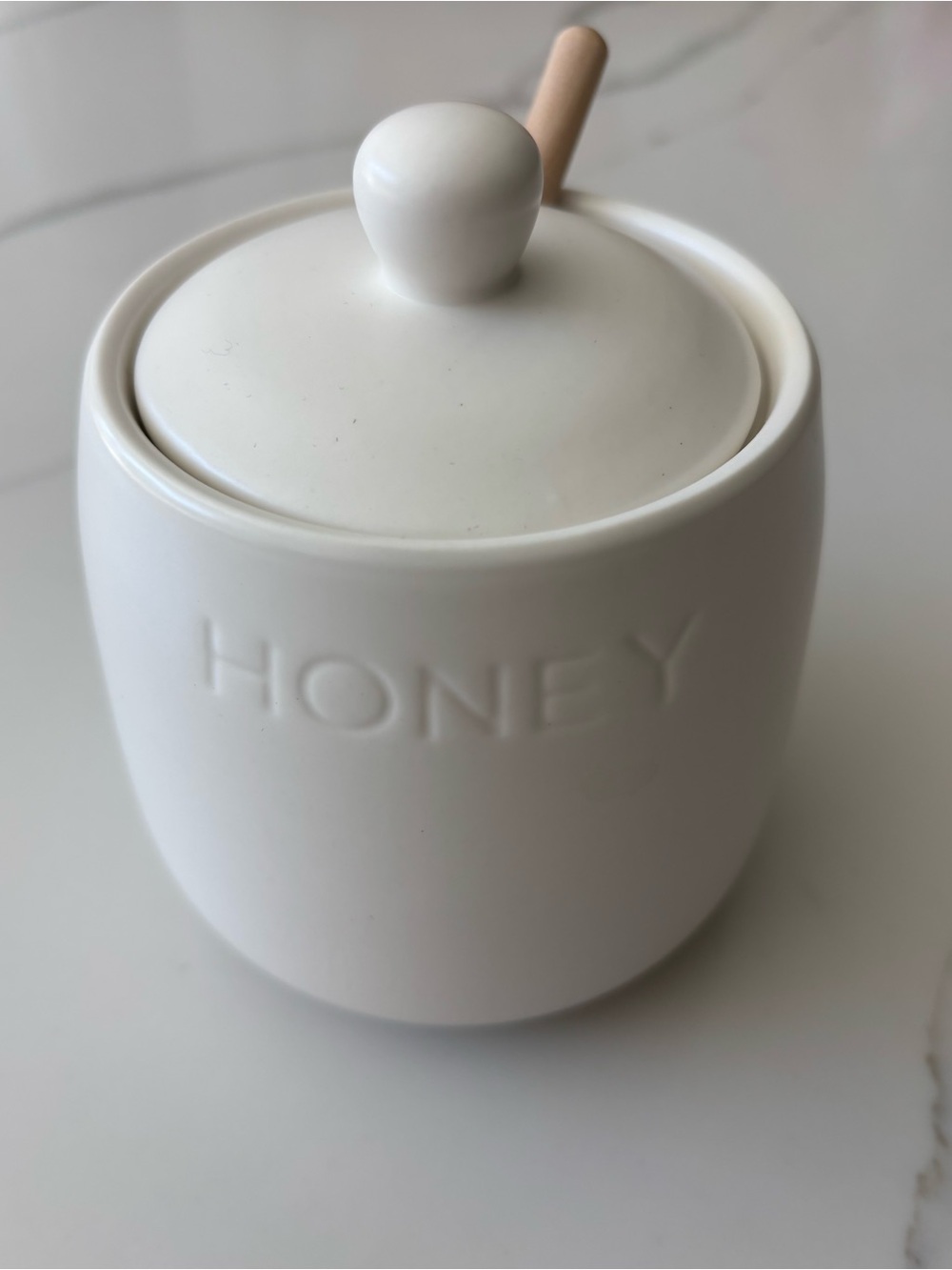 Brand new Bushwick Kitchen white ceramic honey jar with wooden dipper